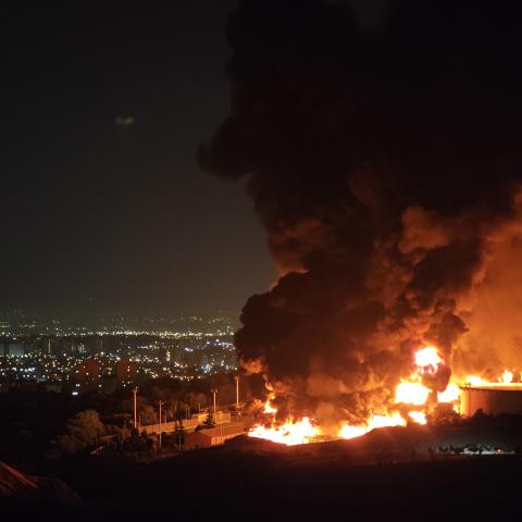 Fire and smoke rise into the sky after an Israeli attack on the Shahran oil depot on June 15, 2025, in Tehran, Iran. (Stringer via Getty Images)