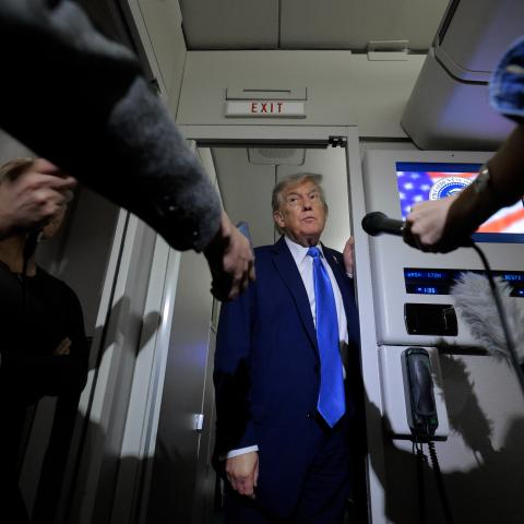 President Donald Trump talks to reporters on board Air Force One after leaving early from the G7 leaders’ summit on June 16, 2025, in Calgary, Alberta, to respond to the conflict between Israel and Iran. (Chip Somodevilla via Getty Images)
