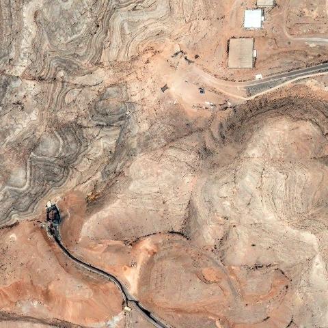 Maxar satellite image shows visible craters and destruction at multiple tunnel entrances following US airstrikes on the Isfahan research center on June 22, 2025. (Satellite Image via Getty Images)