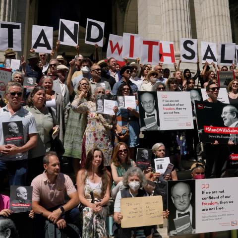 Writers gather to read selected works of author Salman Rushdie to show solidarity for free expression outside the New York Public Library in New York City on August 19, 2022. (Timothy A. Clary/AFP via Getty Images)