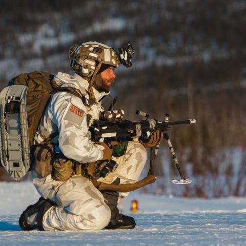 A 10th Special Forces Group Green Beret provides security on the drop zone  March 31, 2023. (U.S. Army photo by Sgt. Luis M. Solorio)