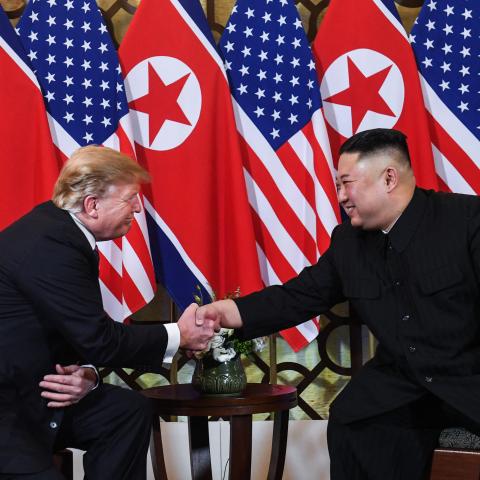 President Donald Trump shakes hands with North Korean leader Kim Jong Un following a meeting at the Sofitel Legend Metropole hotel in Hanoi on February 27, 2019. (Getty Images)