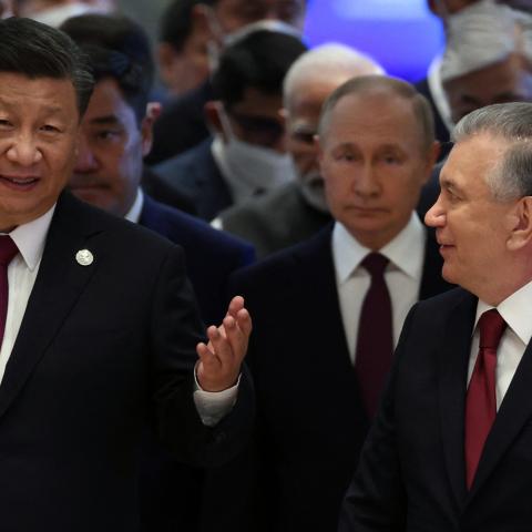 Chinese President Xi Jinping, Russian President Vladimir Putin, Uzbek President Shavkat Mirziyoyev, and other participants attend the Shanghai Cooperation Organization leaders’ summit in Samarkand, Uzbekistan, on September 16, 2022. (Sergei Bobylyov via Getty Images)