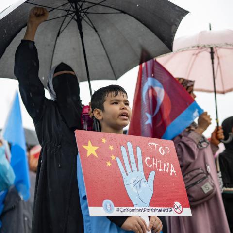 Ethnic Uyghur demonstrators take part in a protest against China near the Chinese consulate in Istanbul on October 1, 2023. (Yasin Akgul via Getty Images)