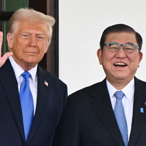 US President Donald Trump waves as he greets Japanese Prime Minister Shigeru Ishiba upon arrival outside the West Wing of the White House in Washington, DC, on February 7, 2025. (Mandel Ngan via Getty Images)