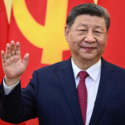 Chinese President Xi Jinping waves during a meeting with Vietnam’s Communist Party General Secretary To Lam at the Office of the Party Central Committee in Hanoi on April 14, 2025. (Nhac Nguyen via Getty Images)