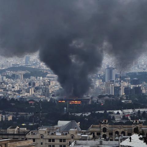 Smoke rises after a reported Israeli strike on a building used by the Islamic Republic of Iran News Network, part of Iran's state TV broadcaster, on June 16, 2025, in Tehran, Iran. (Stringer/Getty Images)