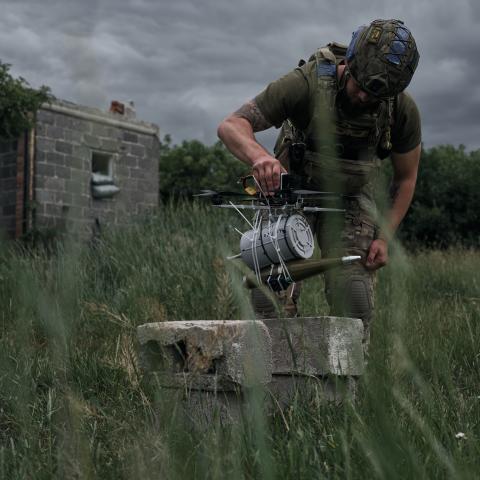 Pilots of the 28th Mechanized Brigade of the Armed Forces of Ukraine test a fiber optic drone with RPG munition on June 18, 2025, near Kostiantynivka, Ukraine. (Kostiantyn Liberov via Getty Images)