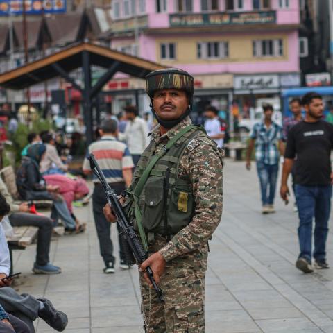 An Indian security personnel stands guard along a street in Srinagar, Jammu and Kashmir, on July 15, 2025. (Firdous Nazir via Getty Images)