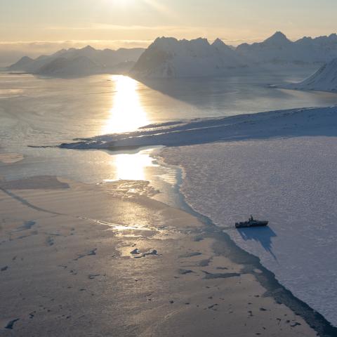 The scientific ice-going Kronprins Haakon sails through the sea ice in eastern Spitzbergen in the Svalbard archipelago on April 10, 2025. (Olivier Morin via Getty Images)