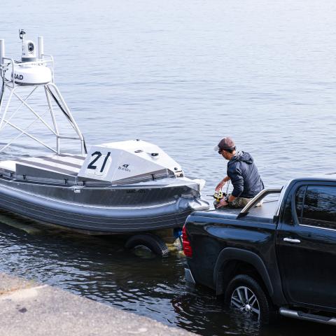 A service member working with Command Task Force 66 unloads a Global Autonomous Reconnaissance Craft into the Port of Uskta during exercise Baltic Operations 2025 (BALTOPS 25) on June 8, 2025. (US Navy photo)