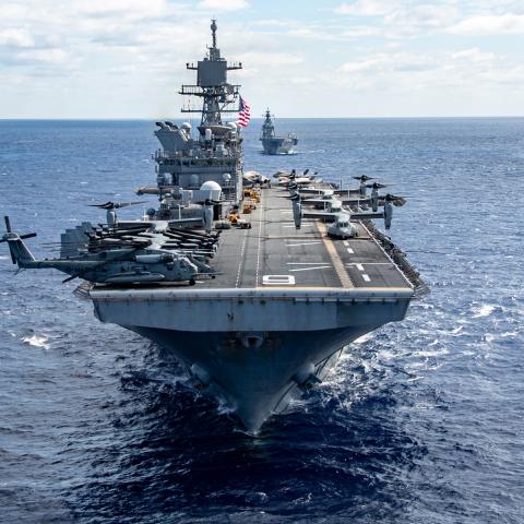 The amphibious assault ship USS America steams alongside other vessels from the US Navy, Royal Australian Navy, Republic of Korea Navy, Royal New Zealand Navy, French Navy, and Japan Maritime Self-Defense Force in the Coral Se on July 20, 2025. (US Navy photo)