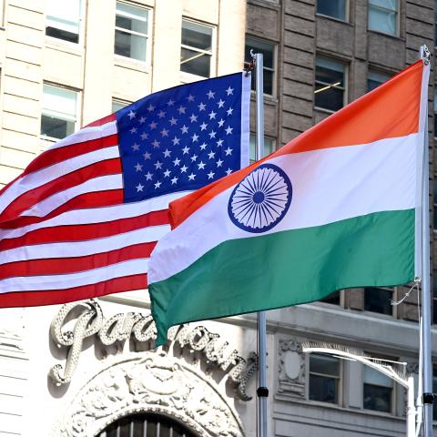The national flag of India is hoisted next to the US national flag at Times Square to mark Indian Independence Day in New York City.  (Jamie McCarthy via Getty Images)