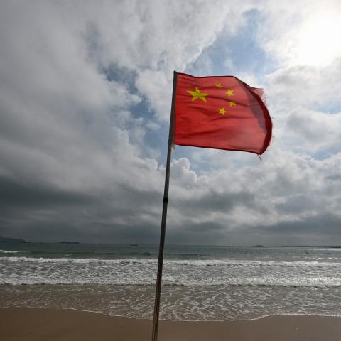 A Chinese flag flutters in the wind at a beach on Pingtan Island, the closest point in China to Taiwan’s main island, in Fujian Province, China, on October 15, 2024. (Adek Berry via Getty Images)