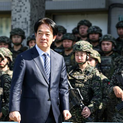 Taiwan’s President Lai Ching-te inspects troops taking part in the Rapid Response Exercise during a visit at the Songshan military airbase in Taipei on March 21, 2025. (I-Hwa Cheng via Getty Images)