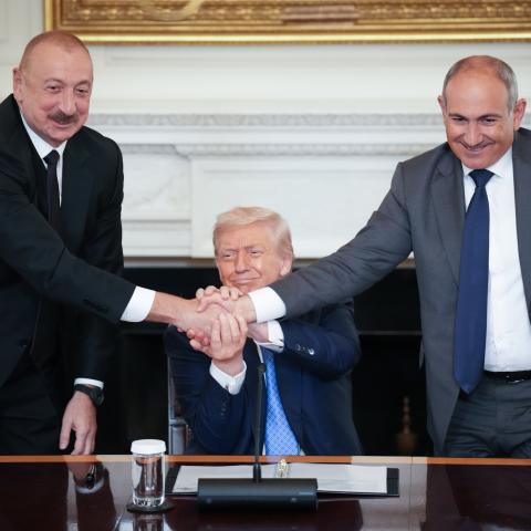US President Donald Trump joins hands with Azerbaijani President Ilham Aliyev, and Armenian Prime Minister Nikol Pashinyan during a signing ceremony in the White House on August 8, 2025, in Washington, DC. (Andrew Harnik via Getty Images)