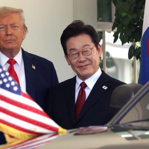 US President Donald Trump greets South Korean President Lee Jae Myung as he arrives at the West Wing entrance of the White House in Washington, DC, on August 25, 2025. (Saul loab via Getty Images) Share to Twitter