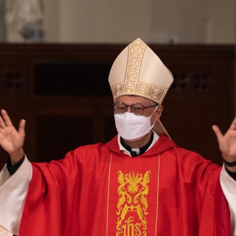 Bishop Stephen Chow waves to church members at the Episcopal Ordination of the Most Reverend Stephen Chow in Hong Kongs Cathedral of the Immaculate Conception on December 4, 2021. (Photo by Bertha Wang/AFP via Getty Images)