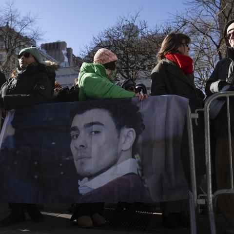Luigi Mangione's supporters gathered outside Manhattan Criminal Court on Friday as he appeared in the court for his hearing on New York state murder and terrorism charges. New York City, U.S., February 21, 2025. (Photo by Mostafa Bassim/Anadolu via Getty Images)