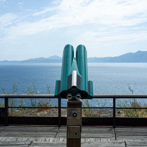 A Telescope pointed at the sea and distant mountains in Cerbere, France, on August 31, 2024. (Getty Images) Share to Twitter