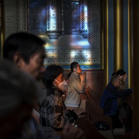 hristian worshippers pray during a scheduled Sunday mass at the Xishiku Catholic Cathedral, or the Church of the Saviour, on April 27, 2025 in Beijing, China. China is estimated to be home to more than 10 million Catholics, and while the Vatican oversees Catholicism worldwide, in China the Communist Party governs the Church. In recent years the late Pope Francis sought to improve relations between the Vatican and Beijing. China's Foreign Ministry said Tuesday, China expresses its condolences for the death o