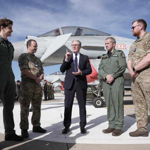 Britain’s Prime Minister Keir Starmer speaks with British armed forces personnel in front of a UK Typhoon fighter jet in Ankara, Turkey, on October 27, 2025. (Getty Images)
