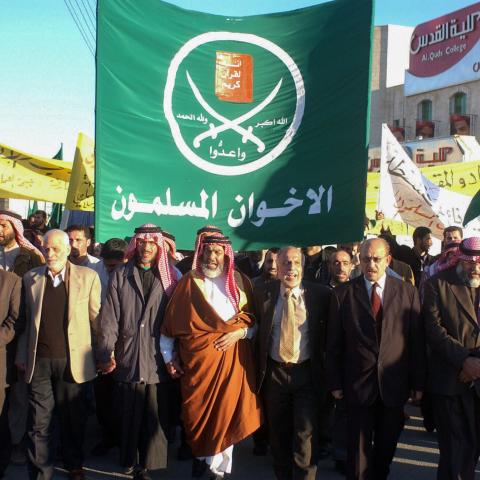 Members of Jordan’s Muslim Brotherhood lead a demonstration in Amman on February 9, 2004. (Getty Images) Share to Twitter