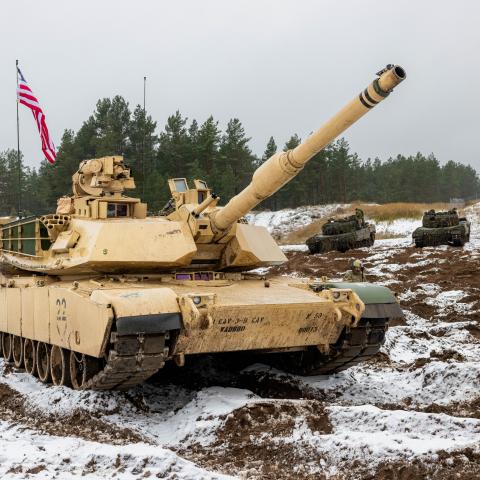 U.S. Soldiers from Battle Company, 3rd Battalion, 8th Cavalry Regiment, prepare to stage a M1A2 SEP Version 3 Abrams tank for ammunition supply during the Iron Spear Tank Competition in Adazi, Latvia, on Nov. 19, 2025. Two armor crews from Battle Company represented the U.S. Army in a multinational tank competition, which aims to strengthen convergence, enhance readiness, and increase lethality across NATO partnerships. This portion of the competition tested the crews’ knowledge and physical skills by putti