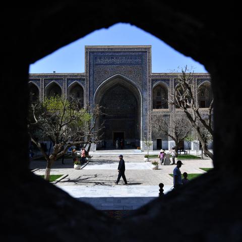 People tour the Registan cultural site in Samarkand, Uzbekistan, on April 3, 2025. (Getty Images)
