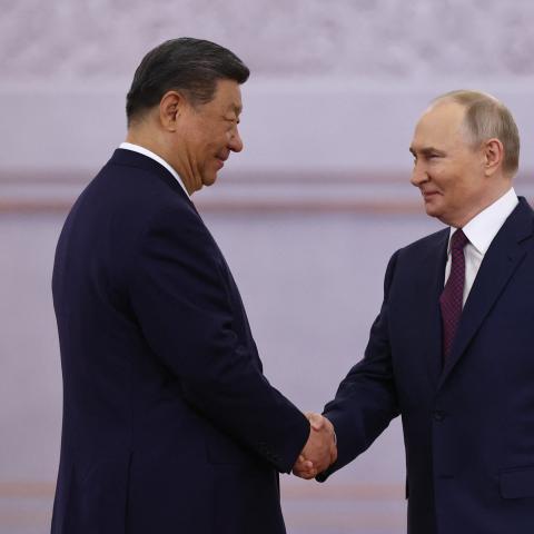 Russian President Vladimir Putin and his Chinese counterpart Xi Jinping shake hands during a welcoming ceremony at the Kremlin in Moscow on May 8, 2025. (Getty Images)