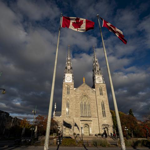 The Canadian flag flies in front of the Notre Dame Cathedral Basilica near Parliament Hill on October 26, 2025, in Ottawa, Ontario, Canada. (Getty Images)