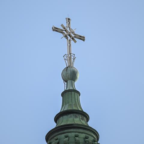 A cross is on the steeple of a church in Montreal, Quebec, Canada, on December 1, 2025. (Photo by Graham Hughes/NurPhoto via Getty Images)