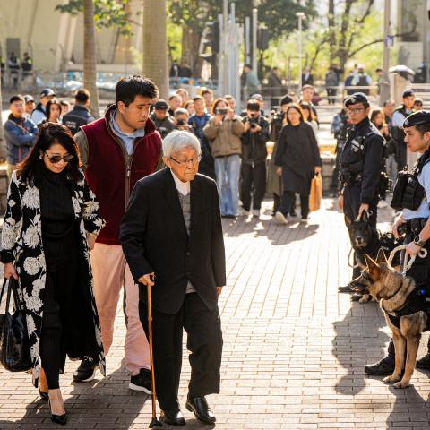Teresa Lai and Lai Shun-yan, the respective wife and son of Jimmy Lai, and Cardinal Joseph Zen, the former bishop of Hong Kong, arrive at the West Kowloon Law Courts building in Hong Kong on December 15, 2025. (Getty Images)