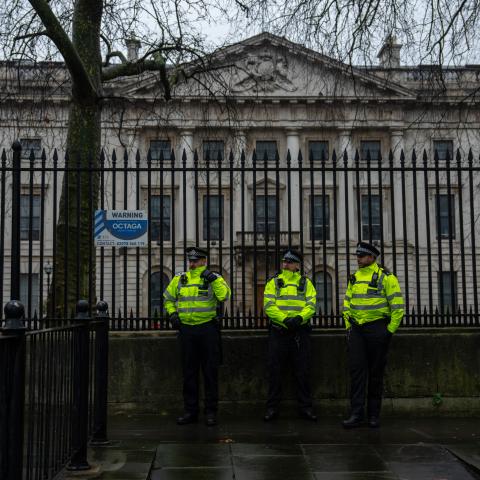 Caption Police officers stand watch during a demonstration at the proposed site of China's embassy on February 8, 2025, in London, England. (Getty Images) Share to Twitter