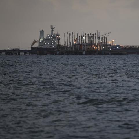 An oil tanker remains anchored at the dock during a walk around the outskirts of the 'El Palito' refinery on December 18, 2025 in Puerto Cabello, Venezuela. President Trump stated on December 17th that Venezuela took away oil rights from the US. Trump's administration has sanctioned Venezuelan oil with blockades, while many US Navy units are deployed off the coast of Venezuela under the premise of combating the drug cartels. (Photo by Jesus Vargas/Getty Images)