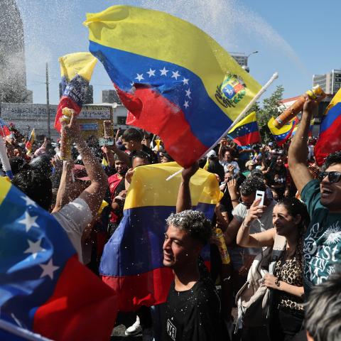Venezuelans living in Chile celebrate in Santiago on January 3, 2026, after US forces captured Venezuelan leader Nicolas Maduro. (Getty Images) Share to Twitter