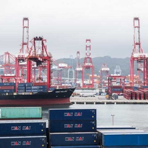 Gantry cranes and shipping containers are seen at the port in Keelung on January 16, 2026. The United States said on January 15 that it has signed a deal with Taiwan to reduce tariffs on goods from the democratic island, while increasing Taiwanese semiconductor and tech companies' investments in America. (Photo by I-Hwa Cheng / AFP via Getty Images)