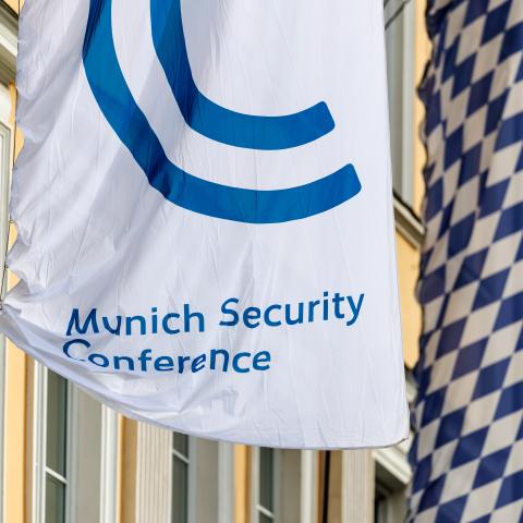 The emblem of the security conference and the inscription "Munich Security Conference" can be seen on a flag on the facade of the Bayerischer Hof in Munich (Bavaria, Germany) on February 12, 2026. The 62nd Munich Security Conference (MSC) will take place from February 13 to 15, 2026 at the Hotel Bayerischer Hof in Munich. The MSC is the world's leading forum for debates on international security policy. Photo: Matthias Balk/dpa (Photo by Matthias Balk/picture alliance via Getty Images)