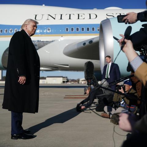 President Donald Trump speaks with the media before boarding Air Force One at Pope Army Airfield on February 13, 2026, in North Carolina. (Getty Images)