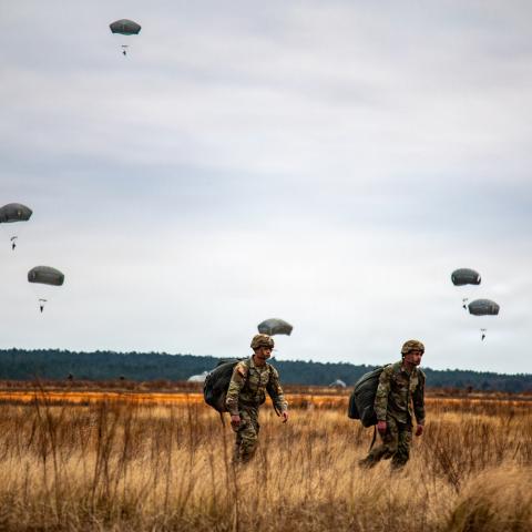 U.S. Army paratroopers assigned to 1st Brigade Combat Team, 82nd Airborne Division conduct an airborne operation onto Sicily Drop Zone at Fort Bragg, North Carolina, 08 December 2022. Airborne operations showcase rapid deployment capabilities and joint readiness within the force.(U.S. Army photo by Sgt. Jillian Hix)