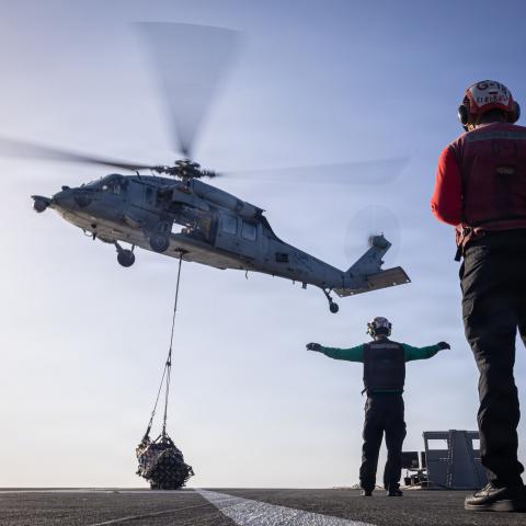An MH-60S Sea Hawk helicopter, attached to Helicopter Sea Combat Squadron 9, delivers cargo to the flight deck of the world’s largest aircraft carrier, USS Gerald R. Ford (CVN 78), during a vertical replenishment with Henry J. Kaiser-class fleet replenishment oiler USNS Kanawha (T-AO 196), while underway during Operation Epic Fury, March 9, 2026. (U.S. Navy photo)