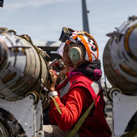 U.S. Sailors, assigned to Strike Fighter Squadron 31, conduct a routine ordnance inspection on the flight deck of the USS Gerald R. Ford (CVN 78), while underway, March 17, 2026. (U.S. Navy photo)
