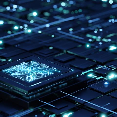 Futuristic central processing unit on the abstract motherboard with blue lights and rays as symbol of data transfers. (Getty Stock Photo) Share to Twitter