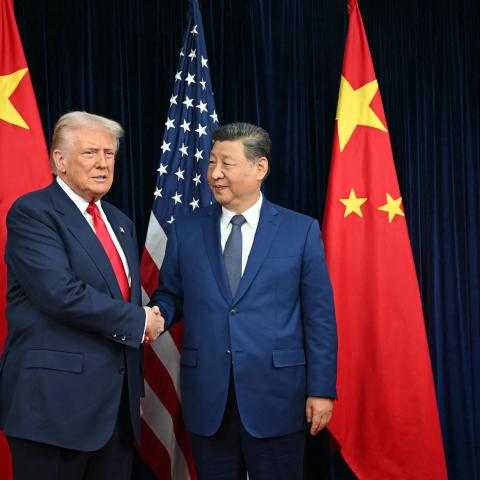 US President Donald Trump and China’s President Xi Jinping shake hands as they arrive for talks at the Gimhae Air Base in Busan, Korea, on October 30, 2025. (Getty Images)
