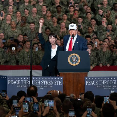 Japanese Prime Minister Sanae Takaichi waves as President Donald Trump speaks aboard USS George Washington on October 28, 2025, in Yokosuka, Japan. (Getty Images)