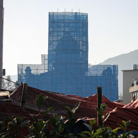 The Yayang church is seen covered in scaffolding in Wenzhou, China, on January 9, 2026. The church in eastern China was scaffolded and had its cross removed, with residents and rights groups saying multiple members had been arrested as a national crackdown on unofficial Christian organizations grew. (Getty Images)