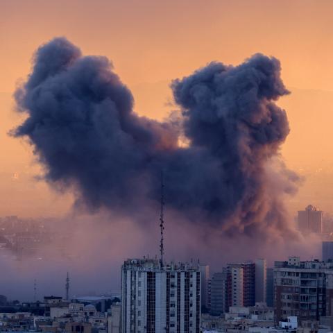 A plume of smoke rises after a strike on the Iranian capital Tehran, on March 3, 2026. (Getty Images)