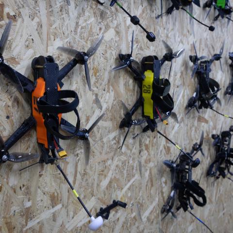  FPV training drones are seen on a wall at the Killhouse Academy drone training center on March 04, 2026 in Kyiv, Ukraine. After four years of Russia's large-scale war against Ukraine, the initial battle of artillery, mechanized columns and defensive trenches have given way to drone-versus-drone warfare, obliterating conventional notions of frontlines and creating vast "kill zones" that expose soldiers, medics and civilians to enemy fire. (Getty Images)