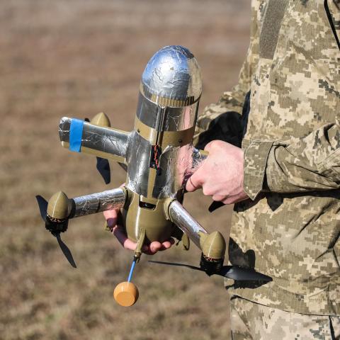 A Ukrainian soldier holds an interceptor drone as his unit carries out combat missions in Ukraine on March 4, 2026. (Getty Images)