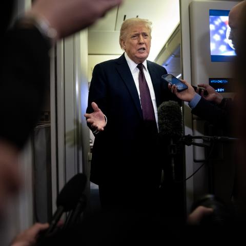 President Donald Trump speaks to members of the media on board Air Force One on March 15, 2026. (Getty Images)